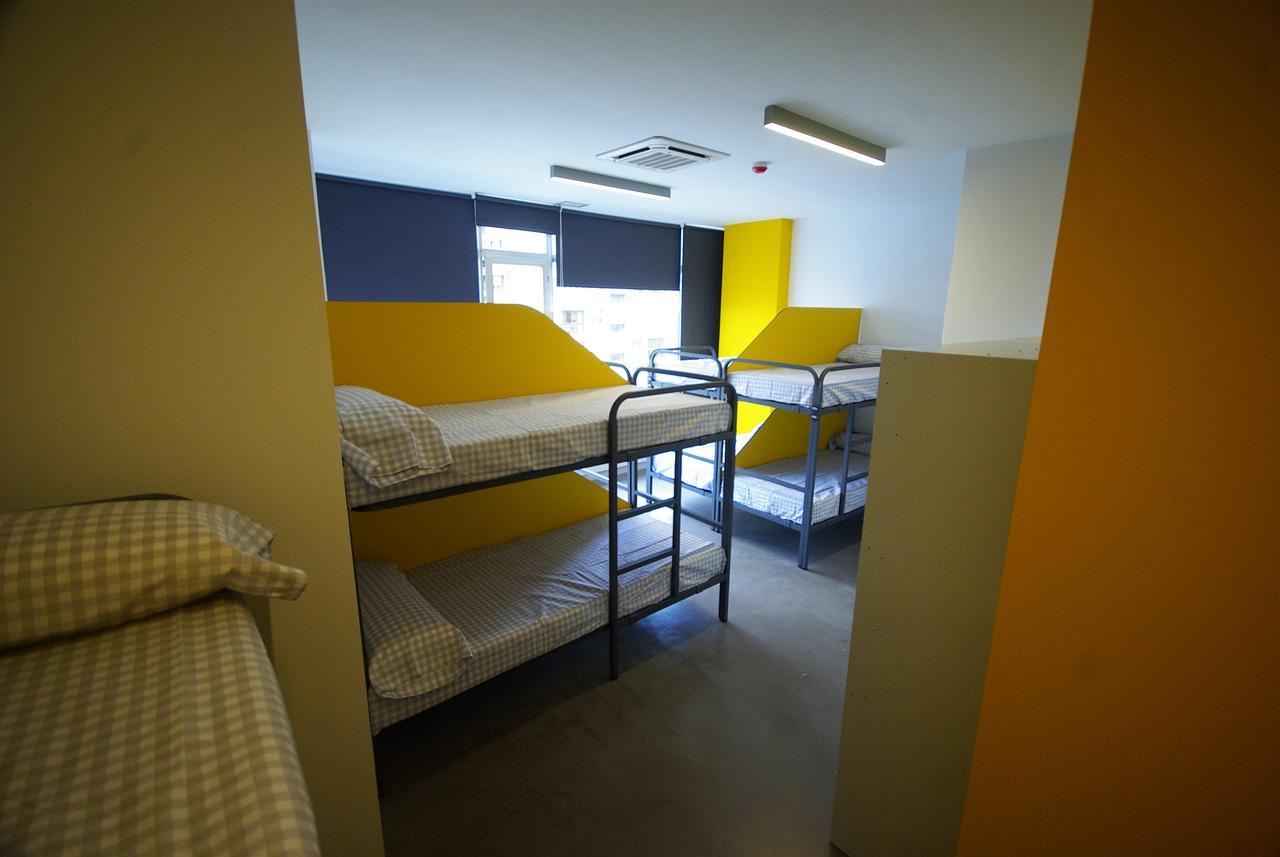 Cama en habitación compartida mixta de 10 camas